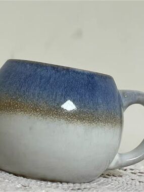 Handcrafted Ceramic Mug in Blue, Brown, and Cream